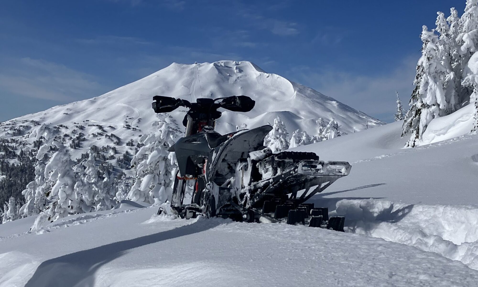 snowbike on scenic mountain range